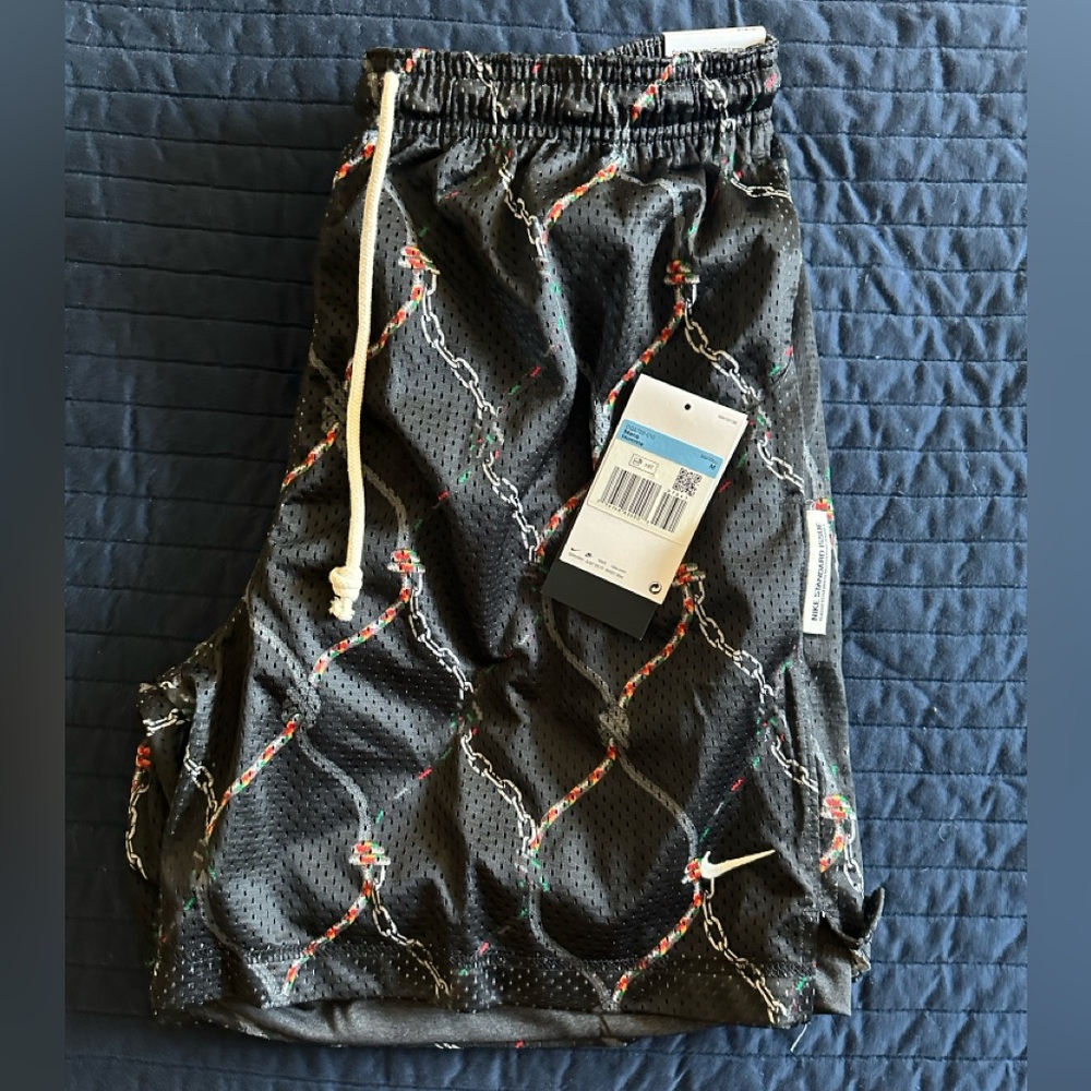 Nike Black Athletic Shorts with Red and White Accents